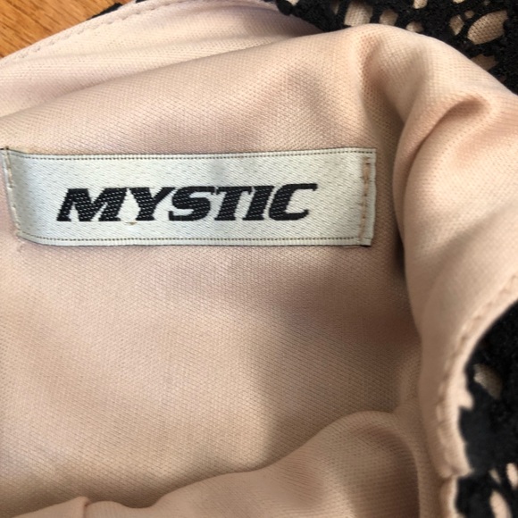 Black lace skater dress with a tan under skirt - Picture 3 of 4